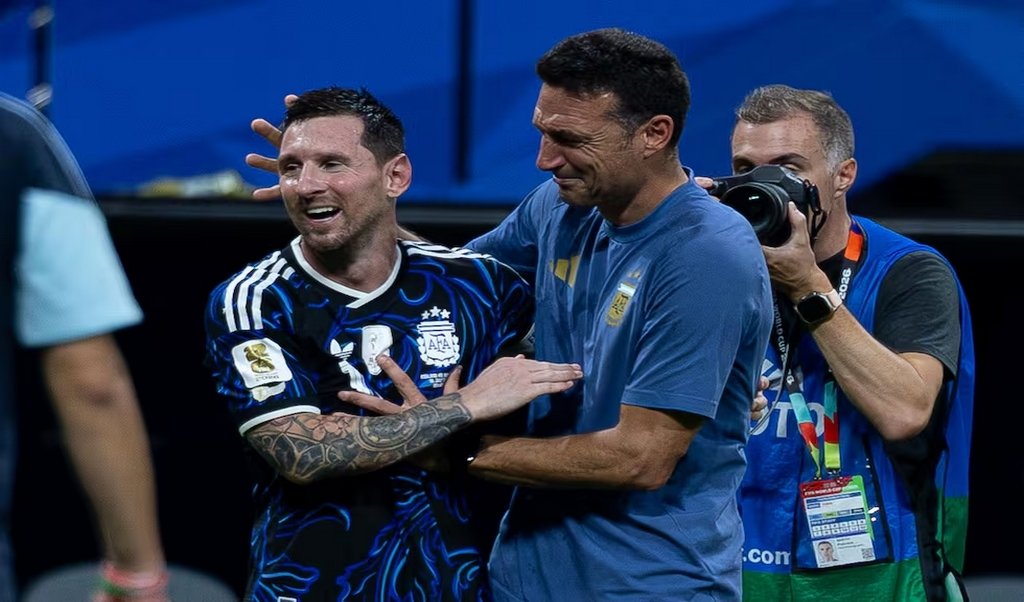 Messi-Scaloni. Odyssey Images via AFP